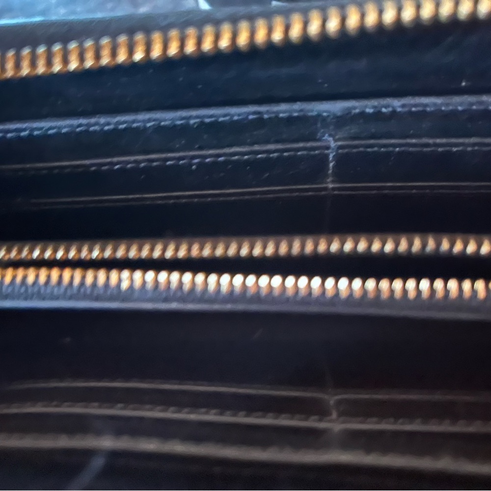 Tory Burch zip around wallet.